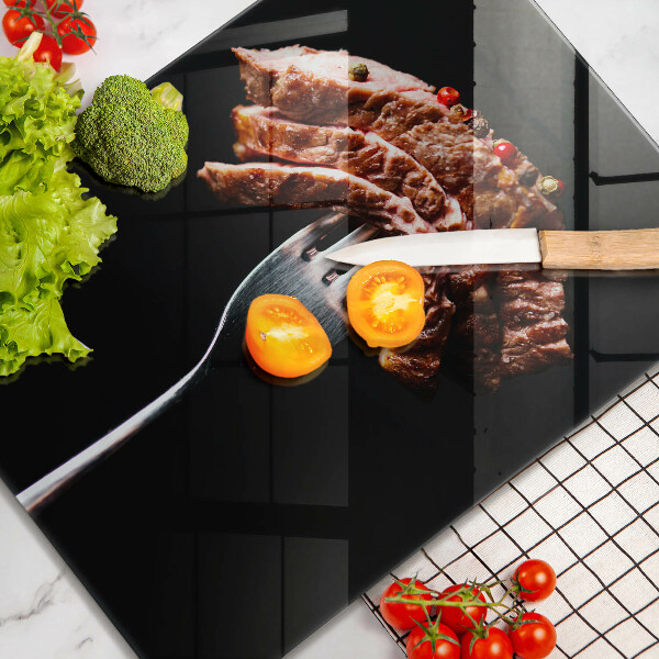 Glass worktop saver Meat on a fork