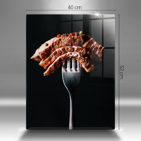 Glass worktop saver Meat on a fork