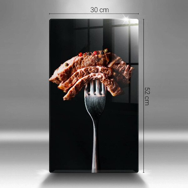 Glass worktop saver Meat on a fork