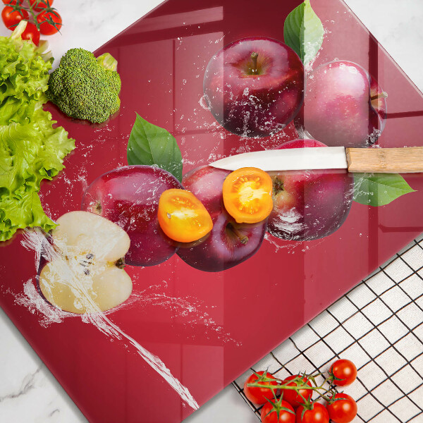 Glass worktop saver Juicy apples in the water