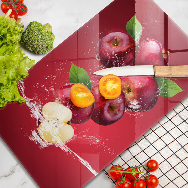 Glass worktop saver Juicy apples in the water