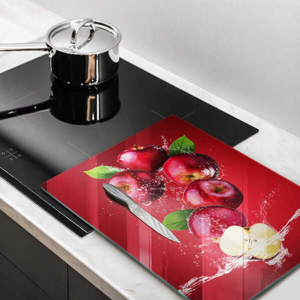 Glass worktop saver Juicy apples in the water