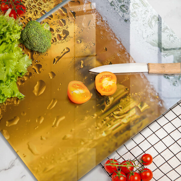 Chopping board Wet glass of beer