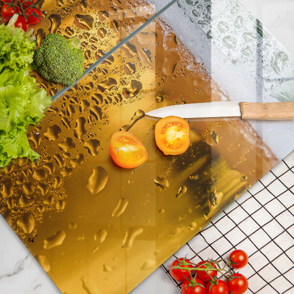 Chopping board Wet glass of beer