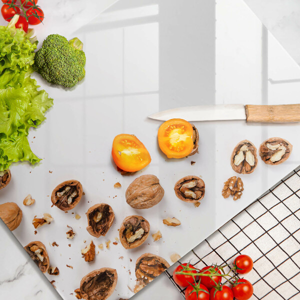 Kitchen chopping board Nuts on a white background