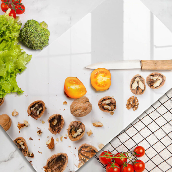 Kitchen chopping board Nuts on a white background