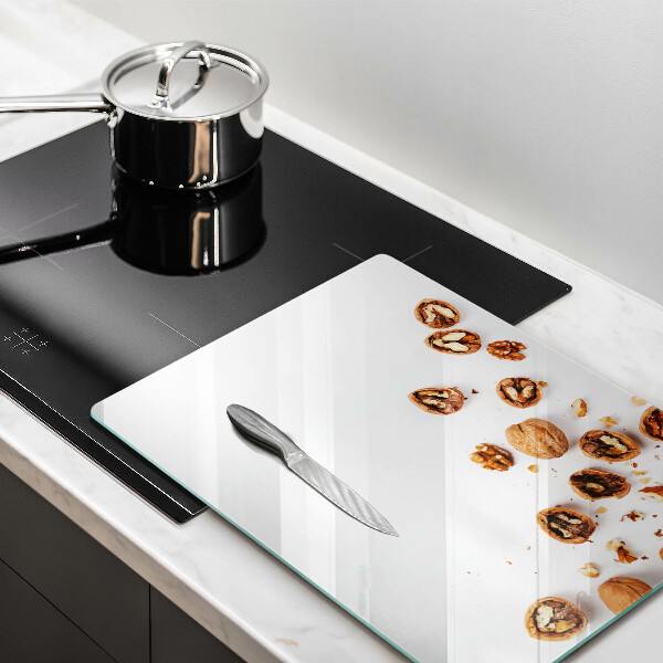 Kitchen chopping board Nuts on a white background
