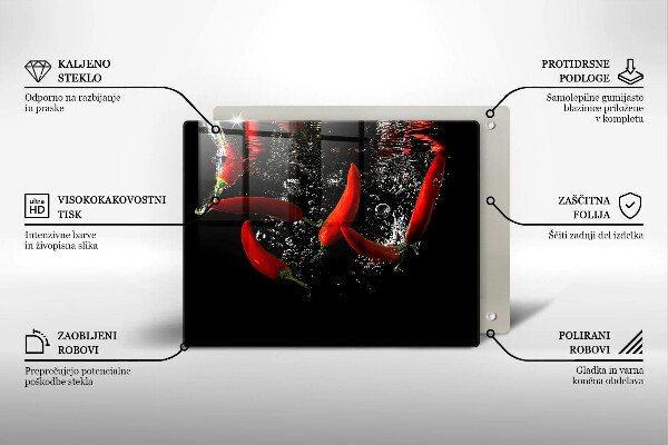 Chopping board glass Chili peppers in water