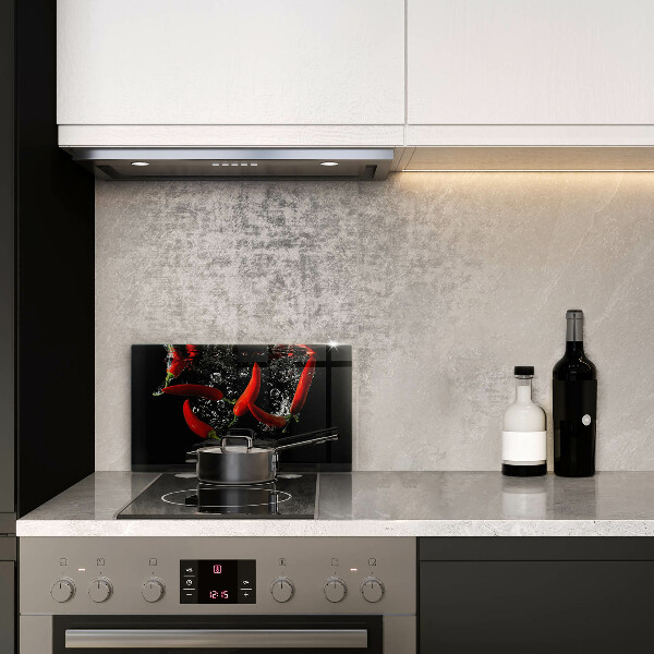 Chopping board glass Chili peppers in water