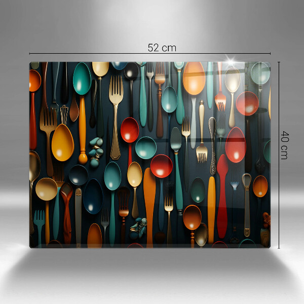 Chopping board Colorful spoons and forks