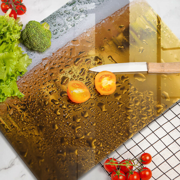 Chopping board Wet glass of beer