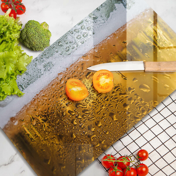 Chopping board Wet glass of beer