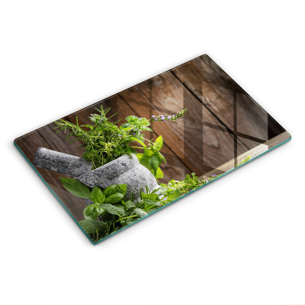 Chopping board glass Herbs plants and wood