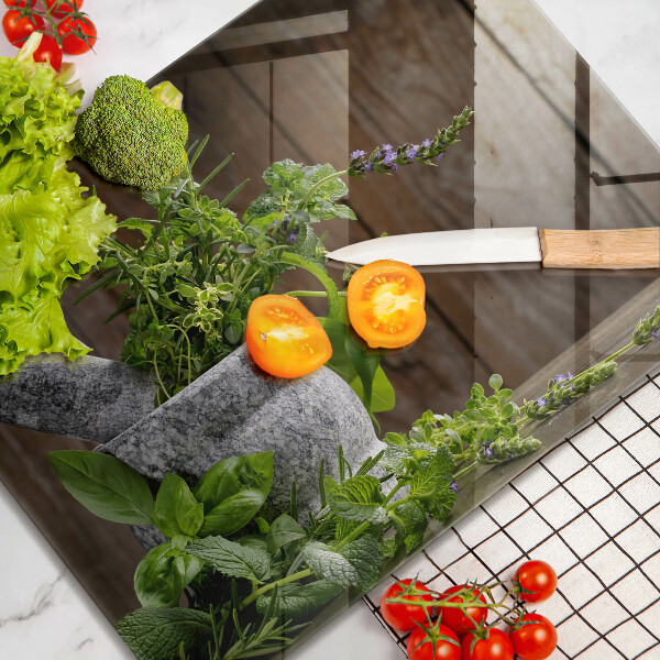 Chopping board glass Herbs plants and wood