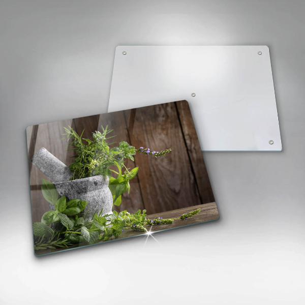 Chopping board glass Herbs plants and wood