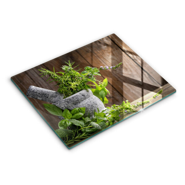 Chopping board glass Herbs plants and wood