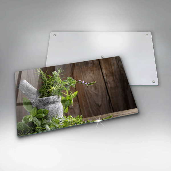 Chopping board glass Herbs plants and wood