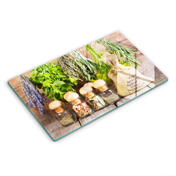 Chopping board glass Herbs spices and wood