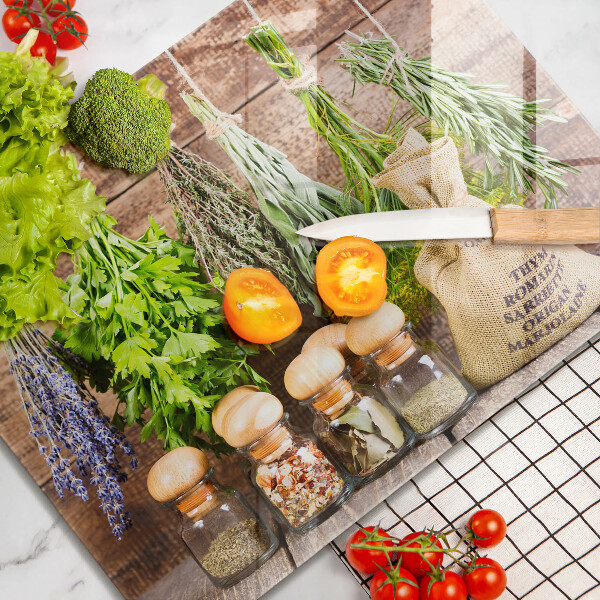 Chopping board glass Herbs spices and wood