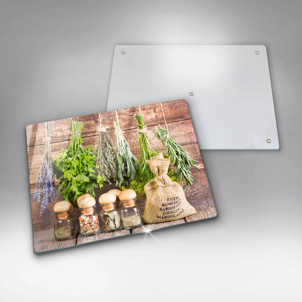 Chopping board glass Herbs spices and wood