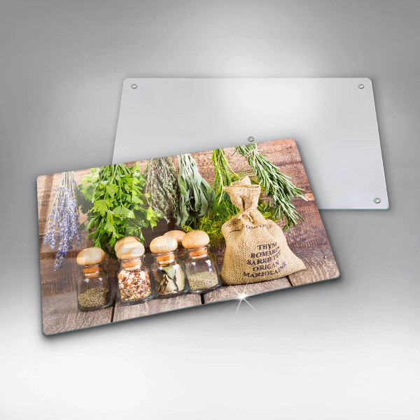 Chopping board glass Herbs spices and wood