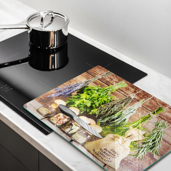 Chopping board glass Herbs spices and wood