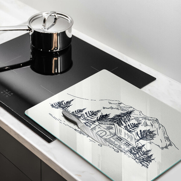 Chopping board glass Drawing a house in the mountains
