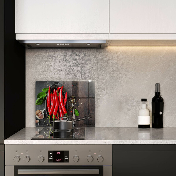 Chopping board glass Red chili peppers