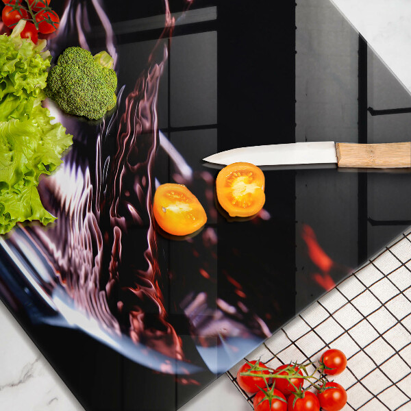 Chopping board A glass of red wine