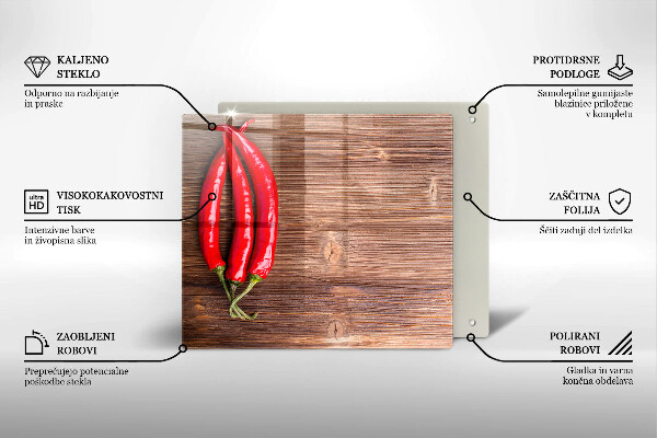 Chopping board Chili peppers on wood