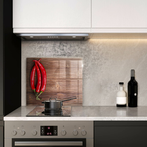 Chopping board Chili peppers on wood