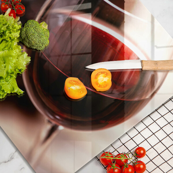 Chopping board A glass of red wine