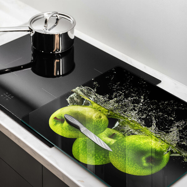 Chopping board Green apples and water