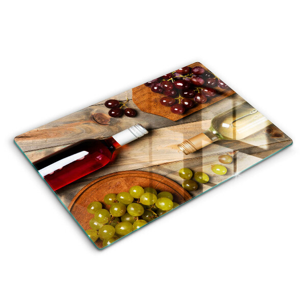 Chopping board glass Bottles of wine and grapes