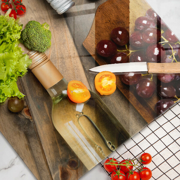 Chopping board glass Bottles of wine and grapes