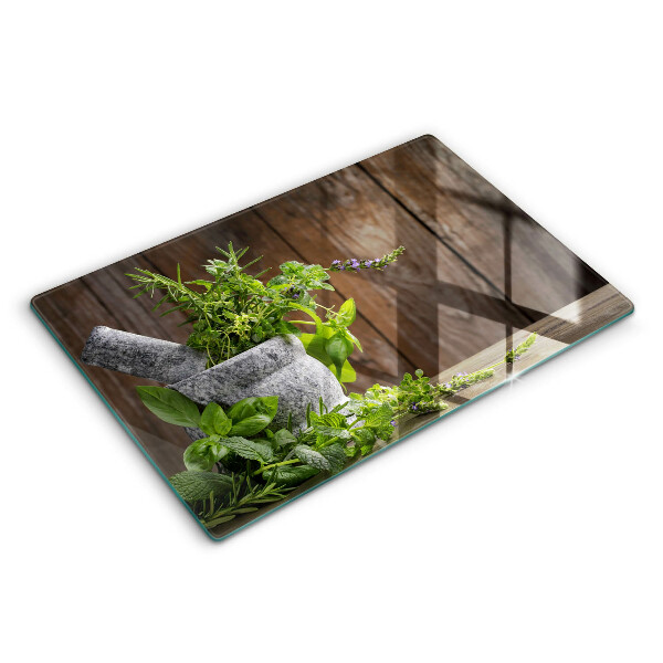 Chopping board glass Herbs plants and wood