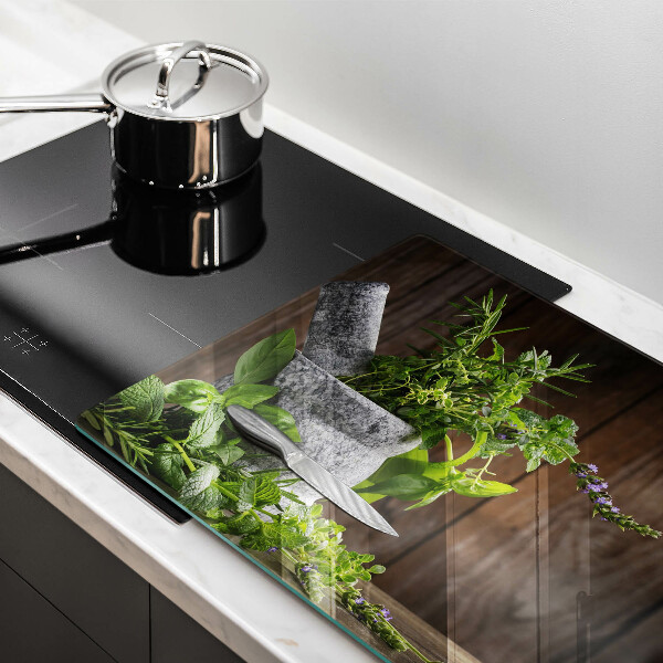 Chopping board glass Herbs plants and wood