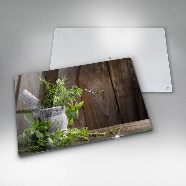 Chopping board glass Herbs plants and wood