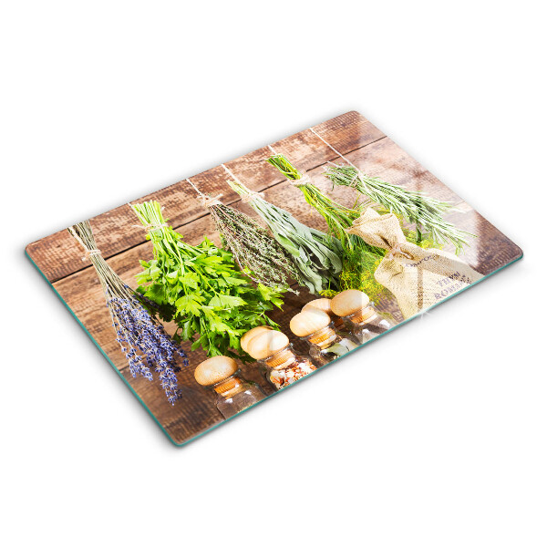 Chopping board glass Herbs spices and wood