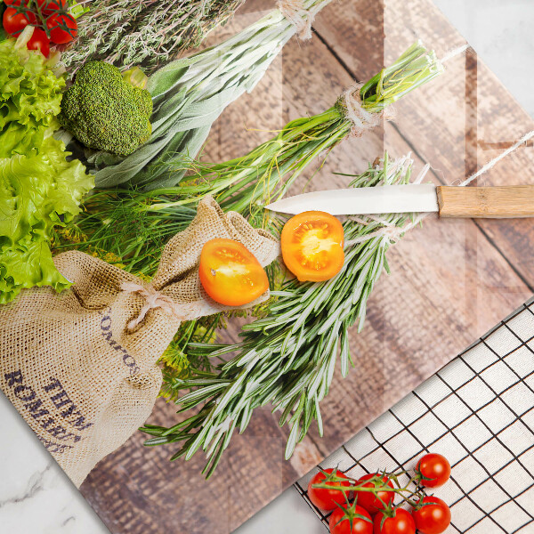 Chopping board glass Herbs spices and wood