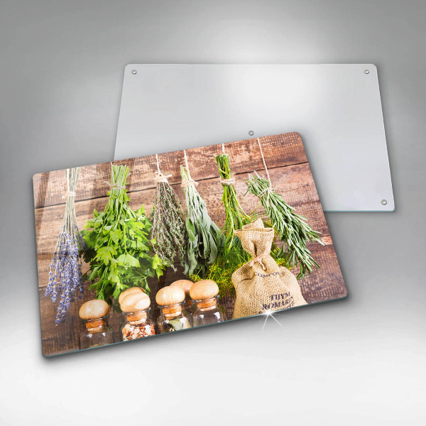 Chopping board glass Herbs spices and wood
