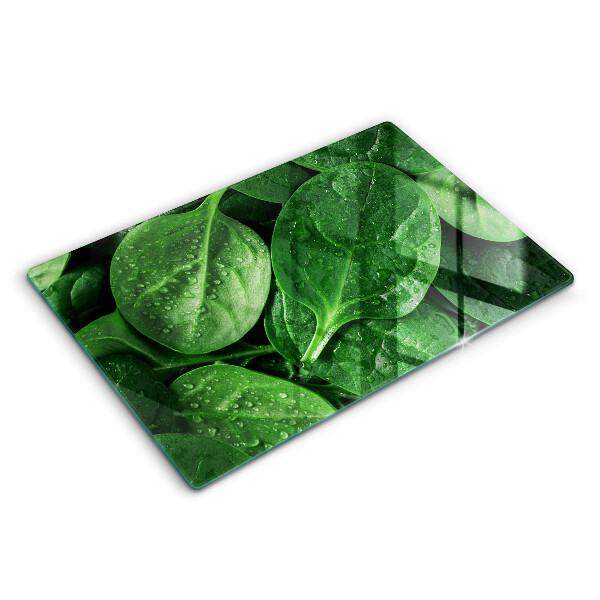 Chopping board glass Basil leaves