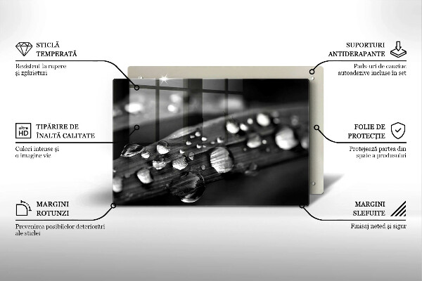 Chopping board glass Drops of dew on the leaves