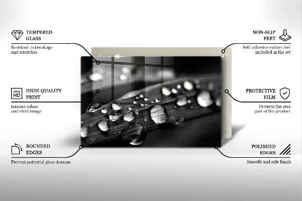 Chopping board glass Drops of dew on the leaves