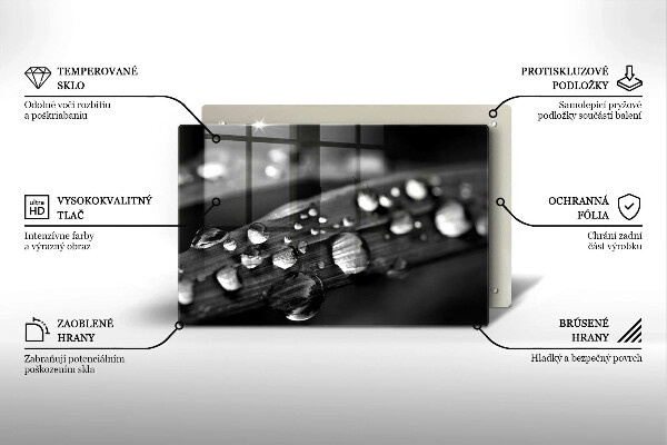 Chopping board glass Drops of dew on the leaves