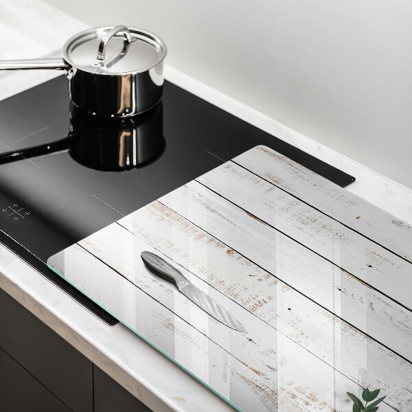 Glass kitchen board Old boards and leaves