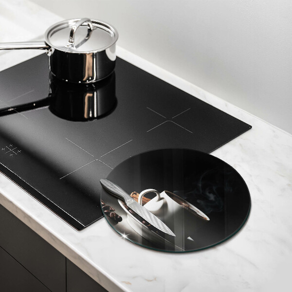 Glass worktop saver A cup of hot coffee