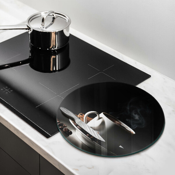 Glass worktop saver A cup of hot coffee