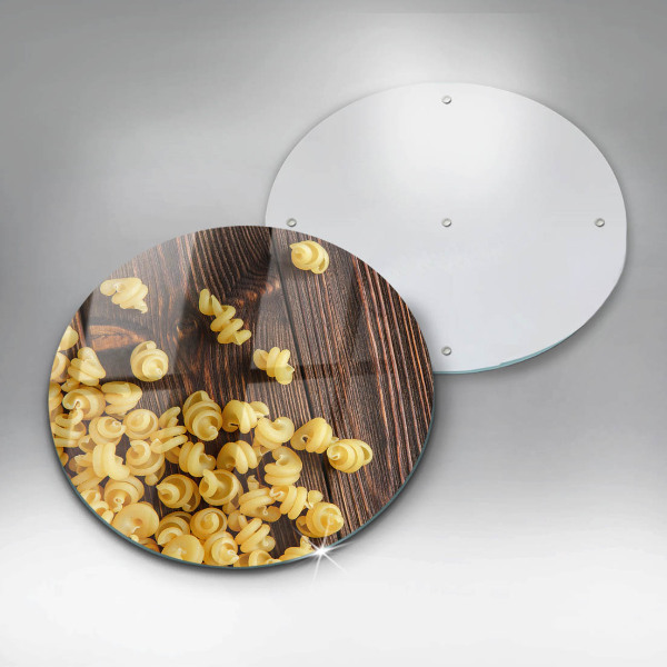 Chopping board glass Pasta on a table
