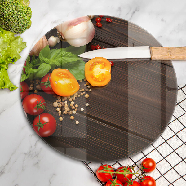 Chopping board glass Vegetables on the table